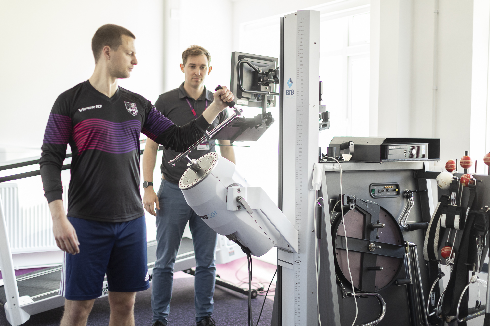 patient and instructor at performance testing equipment