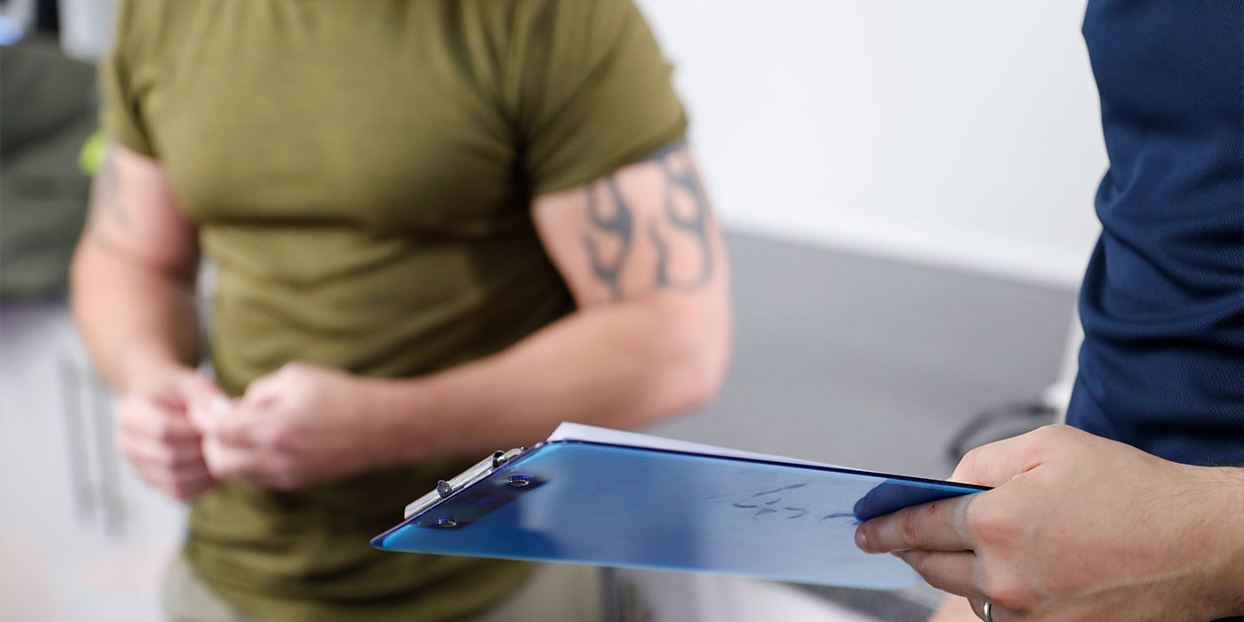 male patient receiving results of his health assessment