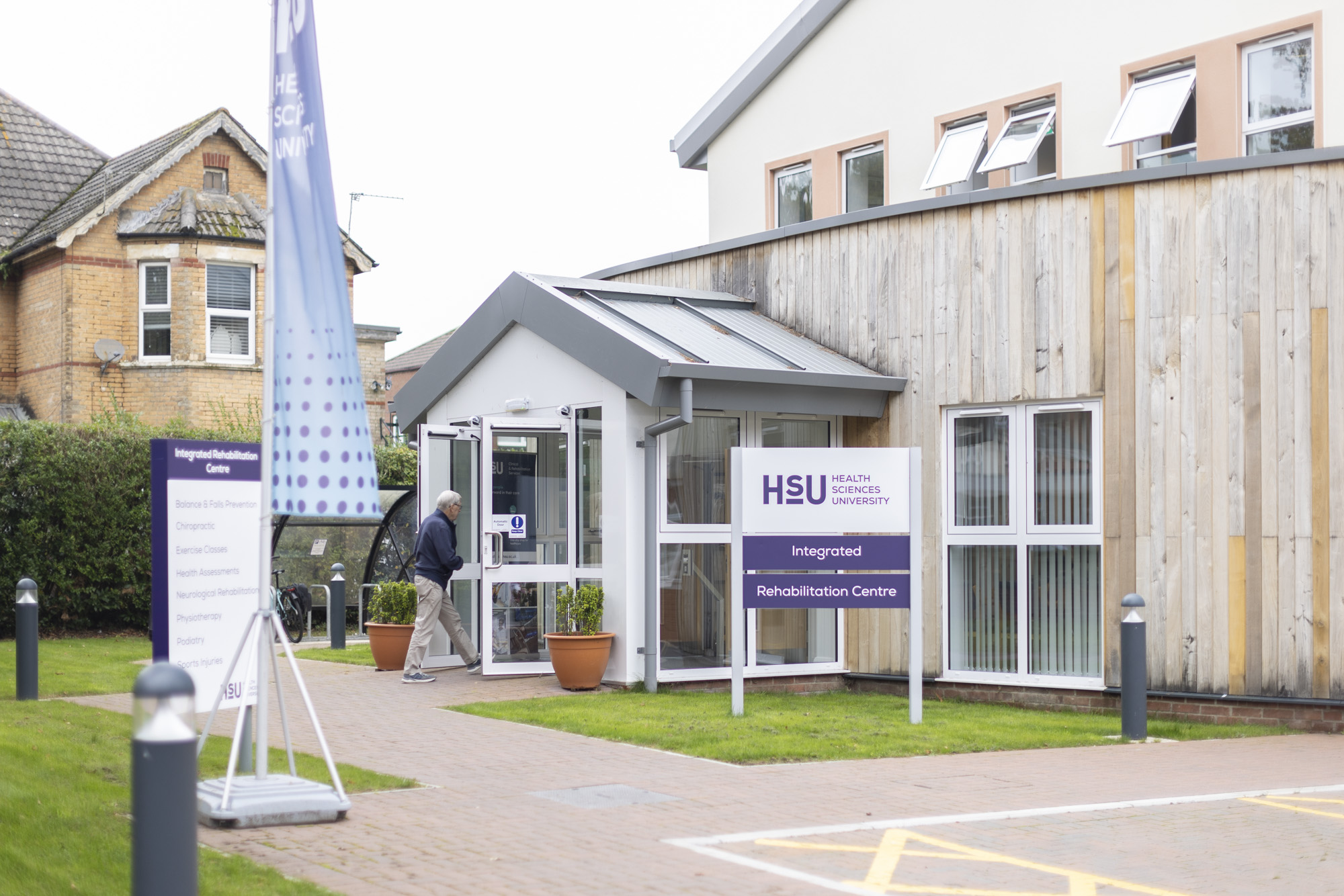 Bright image showing the front entrance to the Integrated Rehabilitation Centre at Health Sciences University