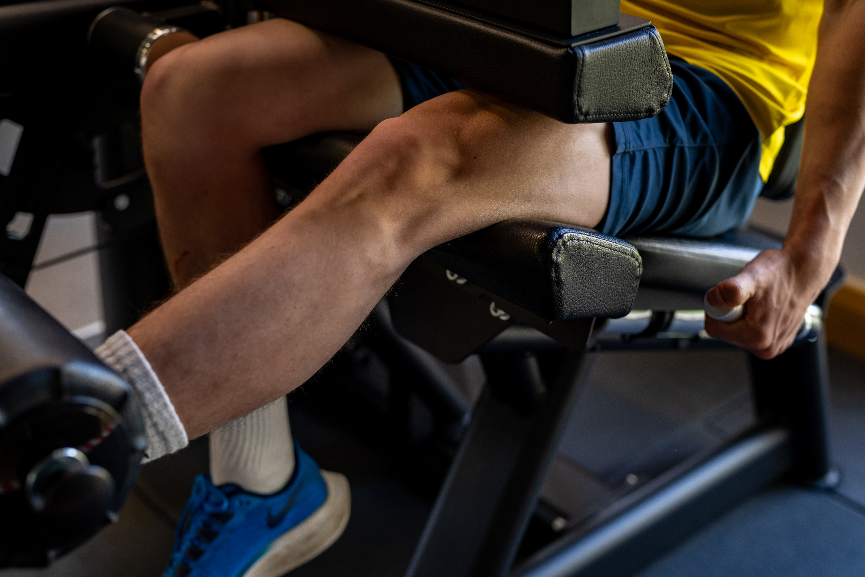 Patient on leg press machine